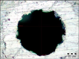 Microscopic image of the hole Ø0.1 mm, magnification 1000x