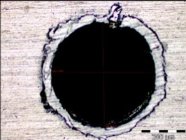 Microscopic image of the hole Ø0.5 mm, magnification 200x